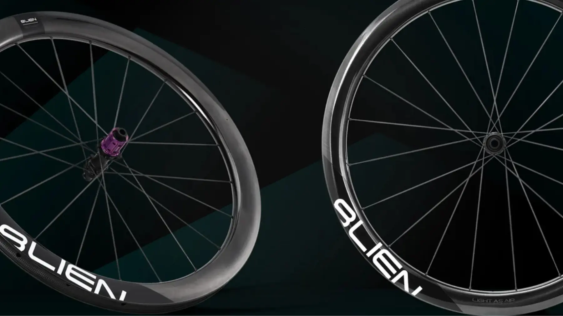 Close-up of 8LIEN carbon wheels in a dark studio